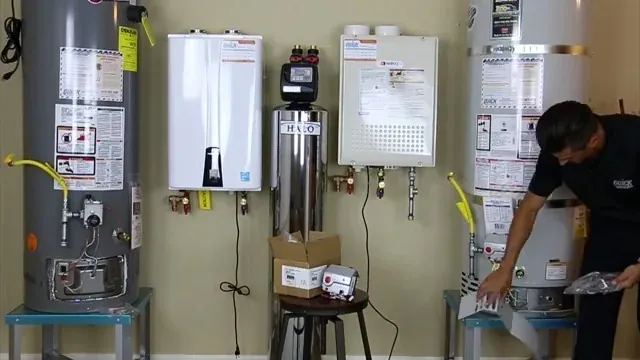 Storage tank and tankless units mounted side by side with a technician at work in Littleton, CO